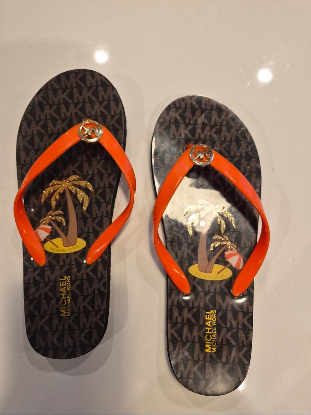 Michael Kors women’s Orange Logo Flip Flops size 8 NWOT